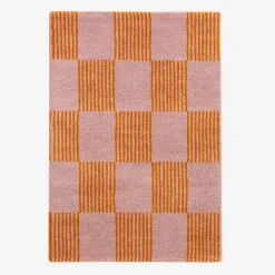Alfombra interior con patrón damero naranja y rosa