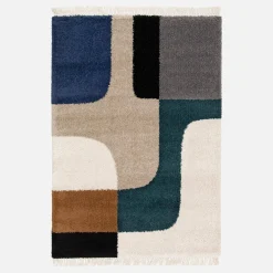 Alfombra interior shaggy con patrones geométricos crema