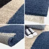 Alfombra interior shaggy con patrones geométricos crema