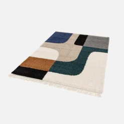 Alfombra interior shaggy con patrones geométricos crema
