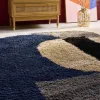 Alfombra interior shaggy de motivos geométricos multicolor