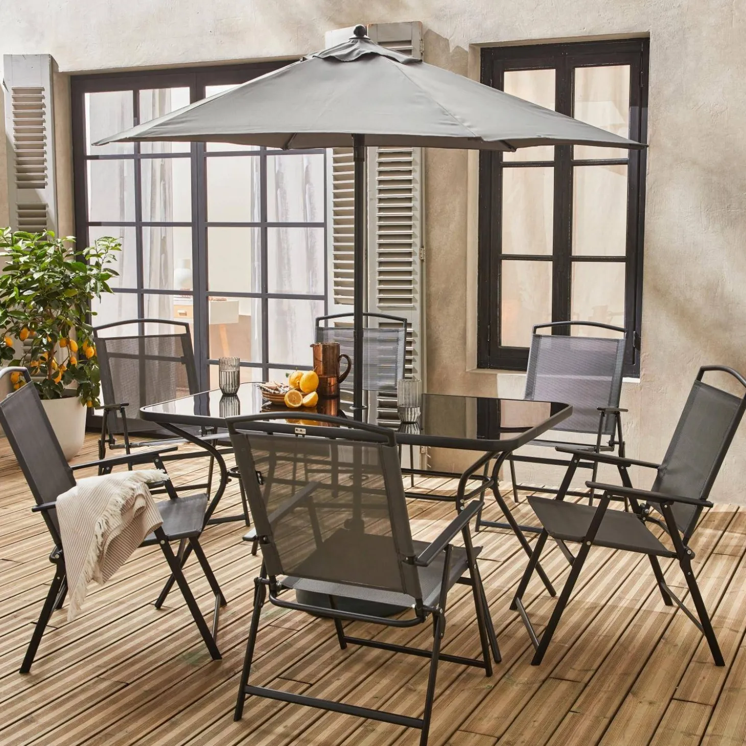 Conjunto mesa de jardín de acero con 6 sillas y 1 sombrilla