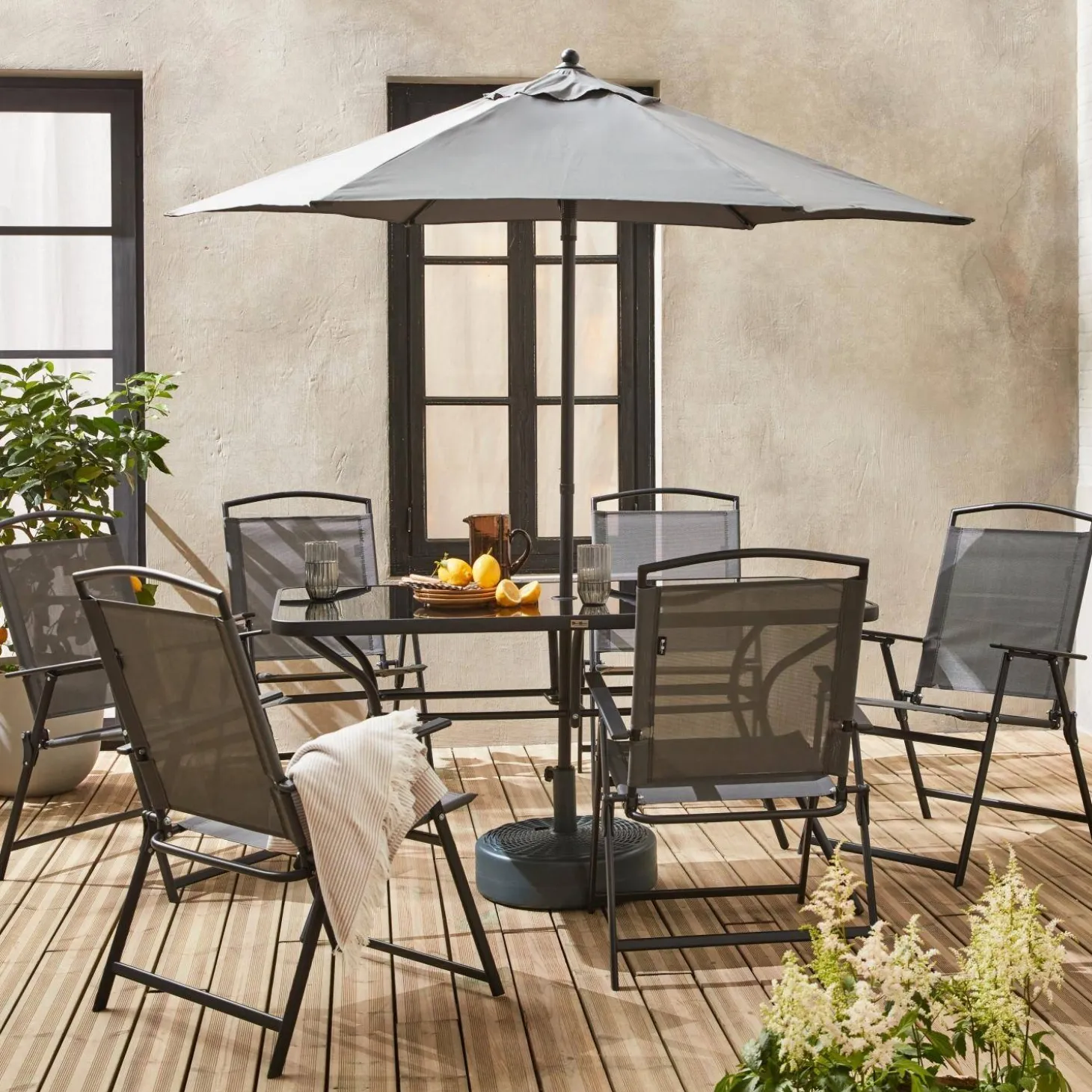 Conjunto mesa de jardín de acero con 6 sillas y 1 sombrilla