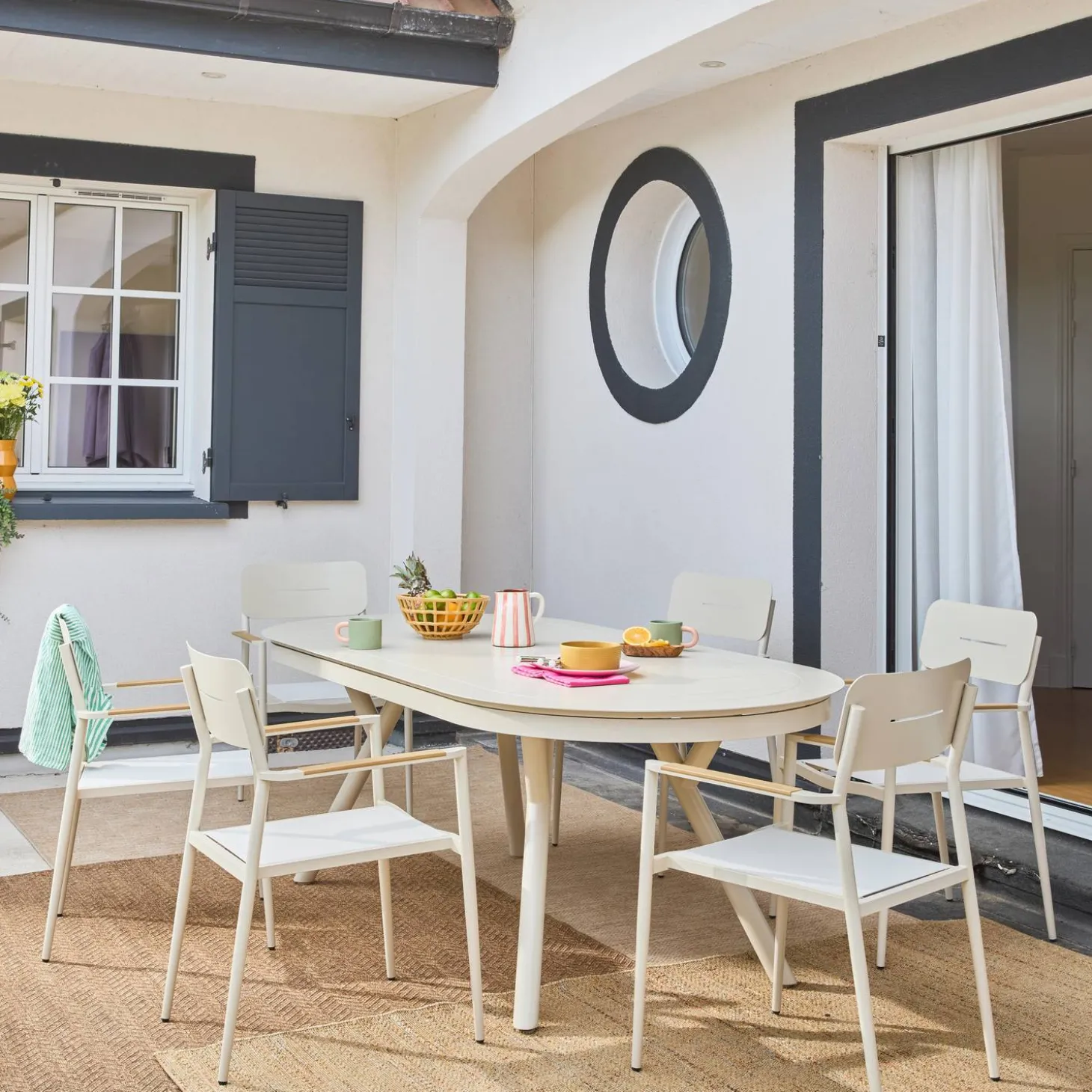 Conjunto mesa de jardín ovalada extensible de aluminio con 6 sillas
