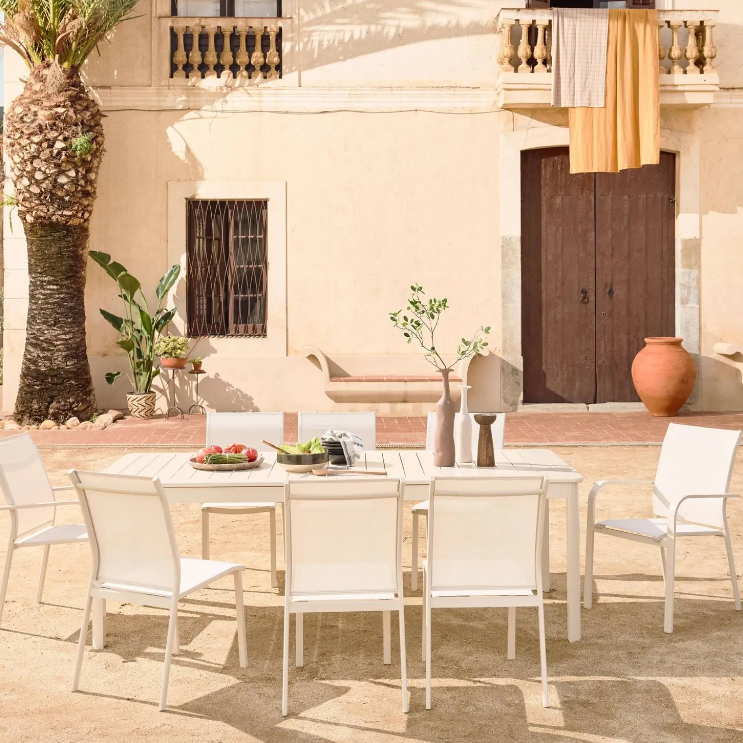 Mesa de jardín extensible de aluminio con 10 sillas