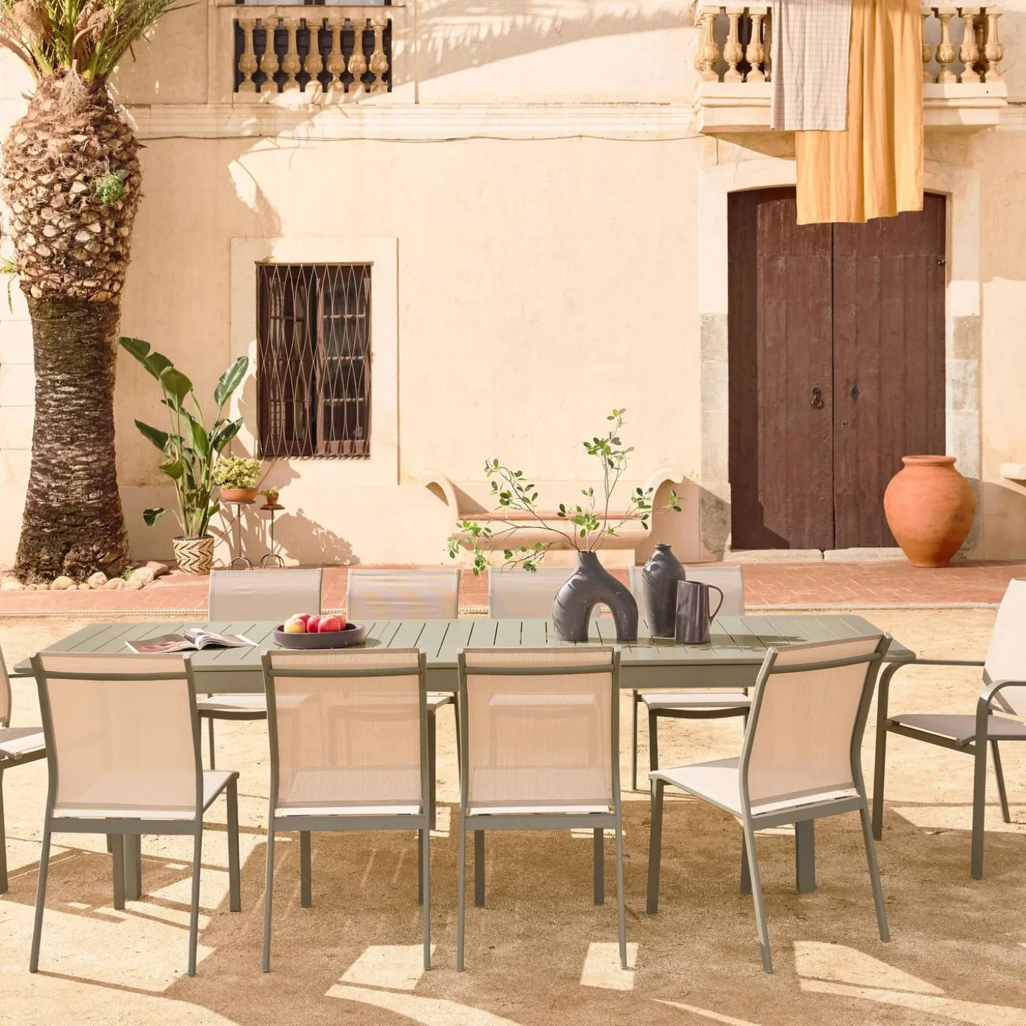 Mesa de jardín extensible de aluminio con 10 sillas