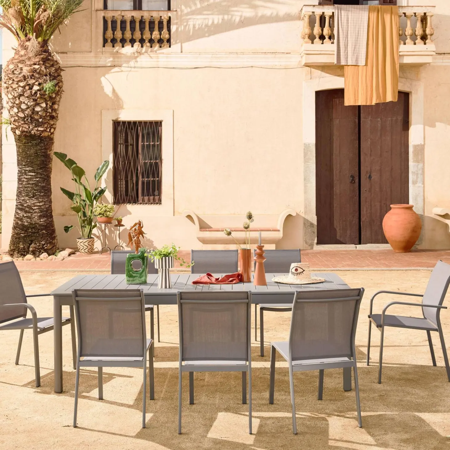 Mesa de jardín extensible de aluminio con 10 sillas