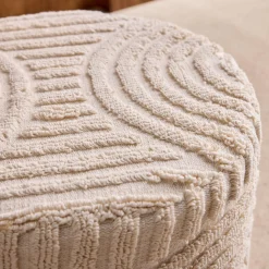 Puff redondo de borreguito con relieve