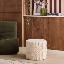 Puff redondo de borreguito con relieve