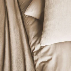 Ropa de cama de gasa y algodón beige