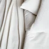 Ropa de cama de gasa y algodón blanco