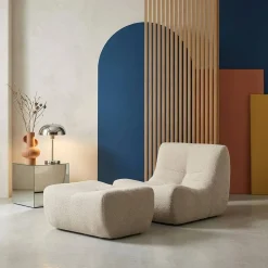 Sillón de borreguito texturizada con reposapiés