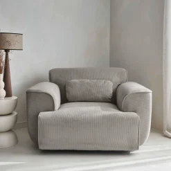 Sillón de pana con cojín