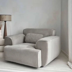 Sillón de pana con cojín