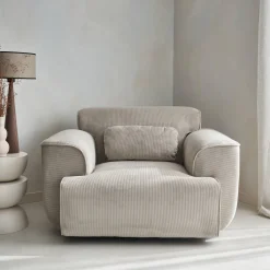 Sillón de pana con cojín
