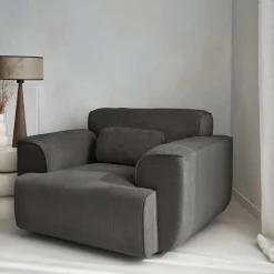 Sillón de pana con cojín