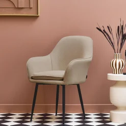 Sillón de pana con patas de metal negro mate