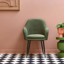 Sillón de pana con patas de metal negro mate