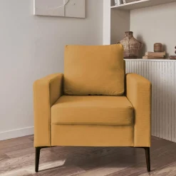 Sillón de pana y patas de metal