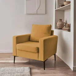 Sillón de pana y patas de metal