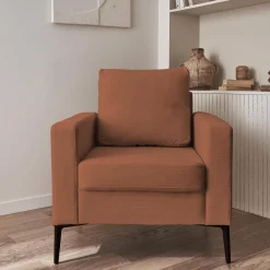 Sillón de pana y patas de metal