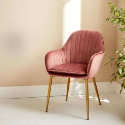 Sillón de terciopelo con patas de metal