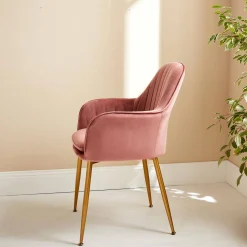Sillón de terciopelo con patas de metal