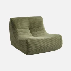 Sillón de terciopelo de pana fina con reposapiés
