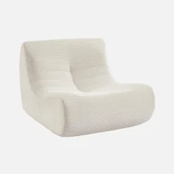 Sillón de terciopelo de pana fina con reposapiés