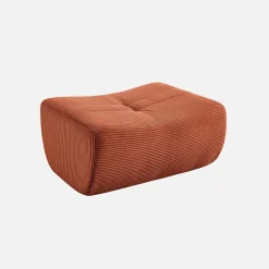 Sillón de terciopelo de pana fina con reposapiés