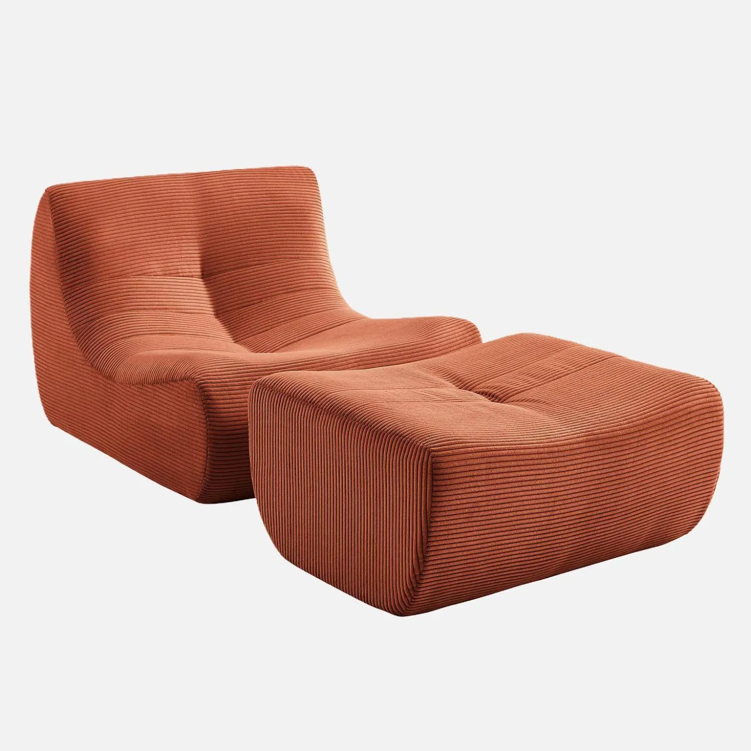 Sillón de terciopelo de pana fina con reposapiés