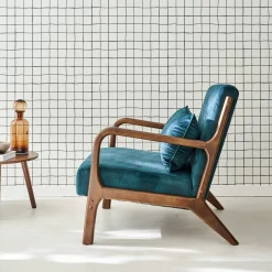 Sillón escandinavo de terciopelo y madera de hevea