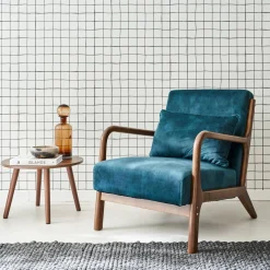 Sillón escandinavo de terciopelo y madera de hevea