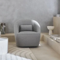 Sillón giratorio de tela 360º con cojín