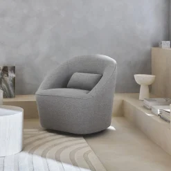 Sillón giratorio de tela 360º con cojín