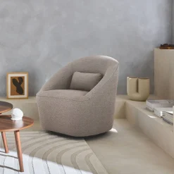 Sillón giratorio de tela 360º con cojín