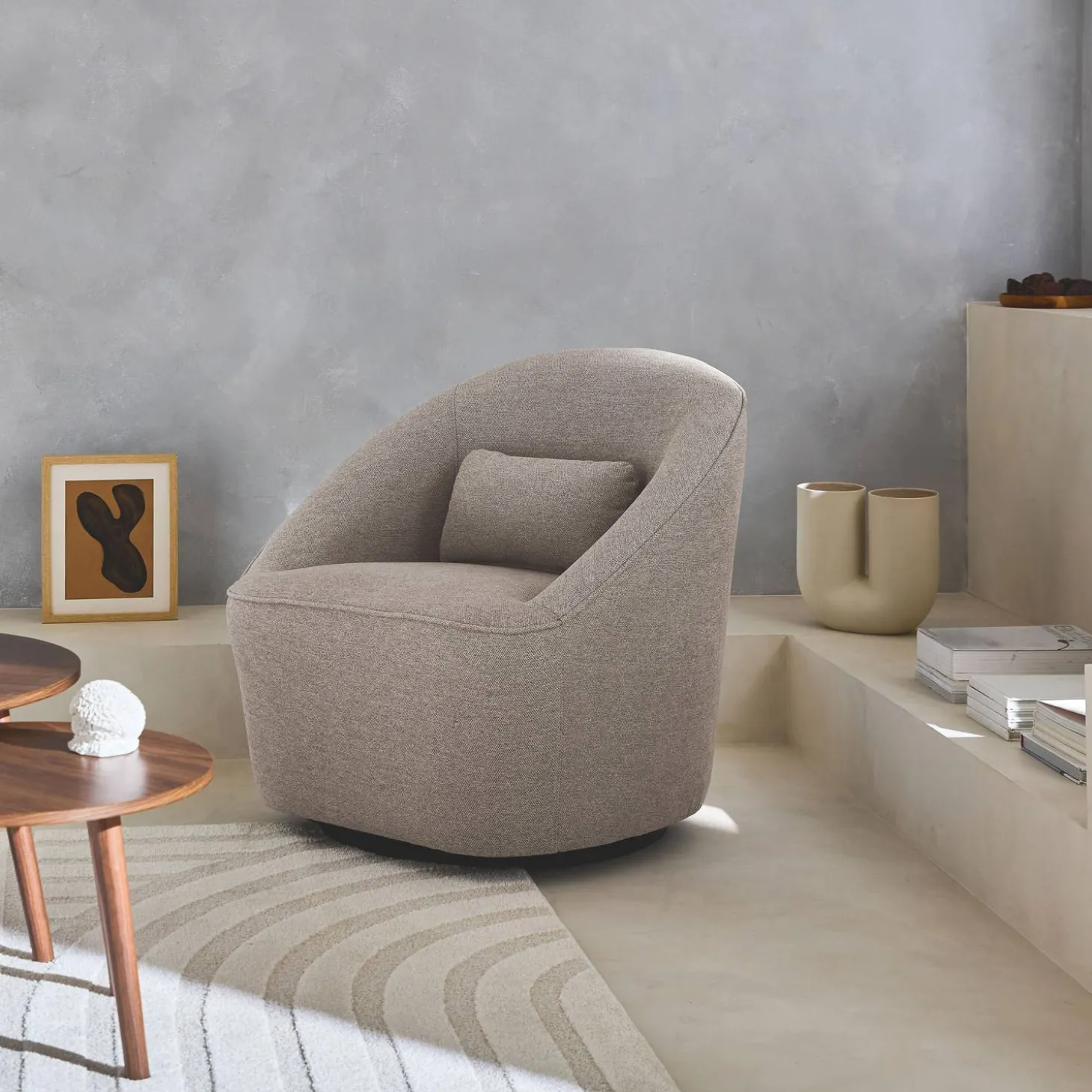 Sillón giratorio de tela 360º con cojín