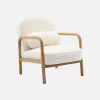 Sillón redondo escandinavo de madera de hevea y tela efecto pelo sintético