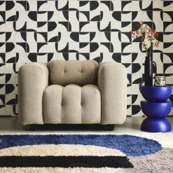 Sillón tapizado en tejido borreguito