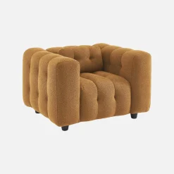 Sillón tapizado en tejido borreguito