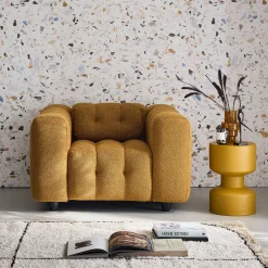 Sillón tapizado en tejido borreguito