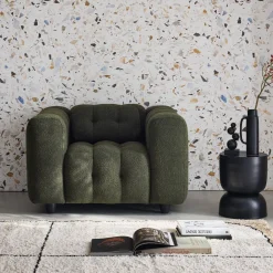 Sillón tapizado en tejido borreguito