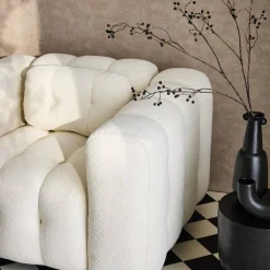 Sillón tapizado en tejido borreguito