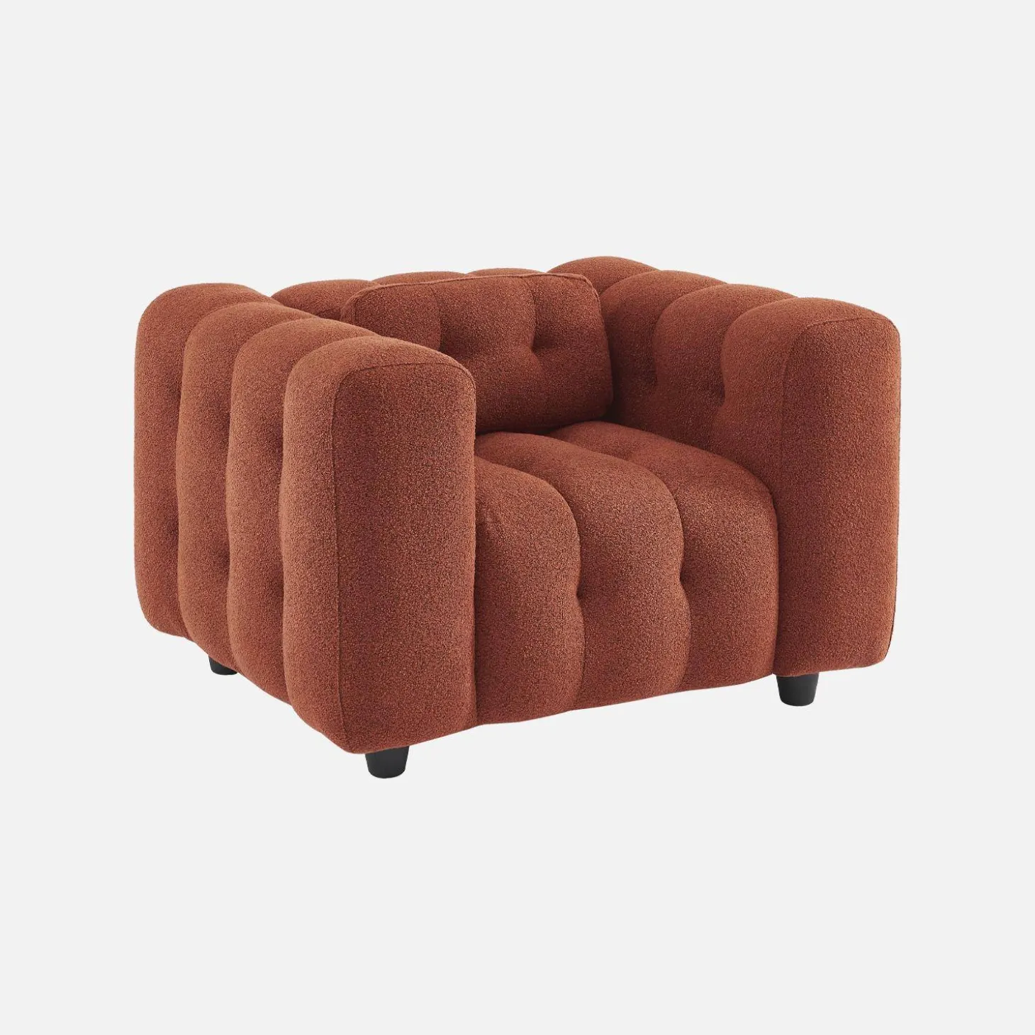 Sillón tapizado en tejido borreguito