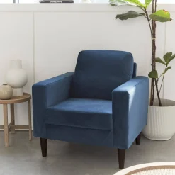 Sillón vintage de terciopelo con patas de madera