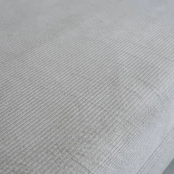 Sofá cama con futón plegable en pana y estructura cromada, 3 plazas