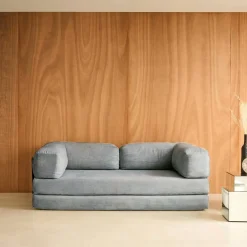 Sofá cama con futón plegable en pana y estructura cromada, 3 plazas