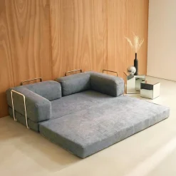 Sofá cama con futón plegable en pana y estructura cromada, 3 plazas