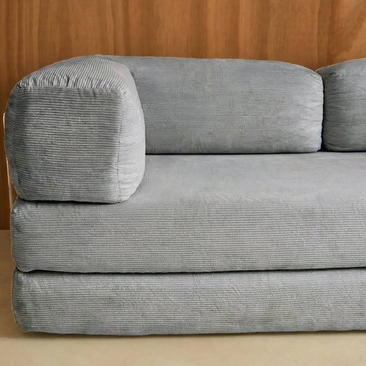 Sofá cama con futón plegable en pana y estructura cromada, 3 plazas