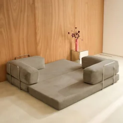 Sofá cama con futón plegable en pana y estructura cromada, 3 plazas